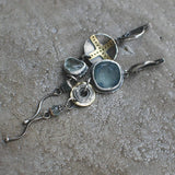 Old náušnice with blue kamene and a cross