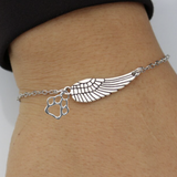 Strieborný memorial ribbon with an angel wing and footprint | Handmade