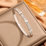 Simple geometric open náramok with two layers of zircon