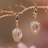White vintage tulip-shaped náušnice with cubic zirconia