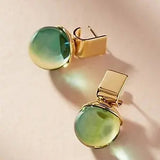 Vintage náušnice with green krištáľové in a golden hue