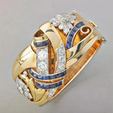 Vintage golden prsteň with blue zircon