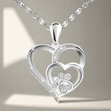 Srebrna ogrlica s a footprint i a heart s a cubic zirconia